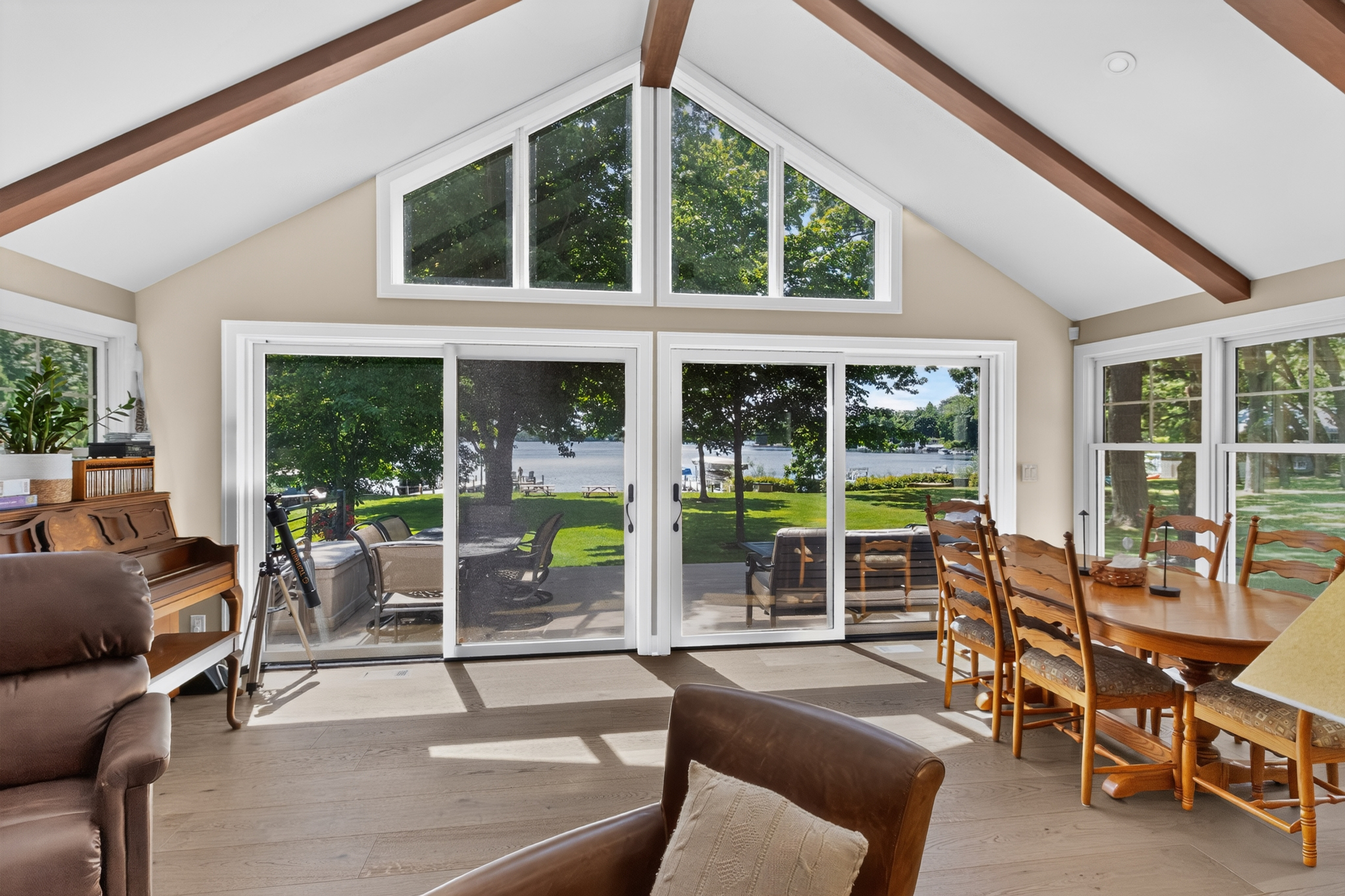 lake house interior with large triangular windows 